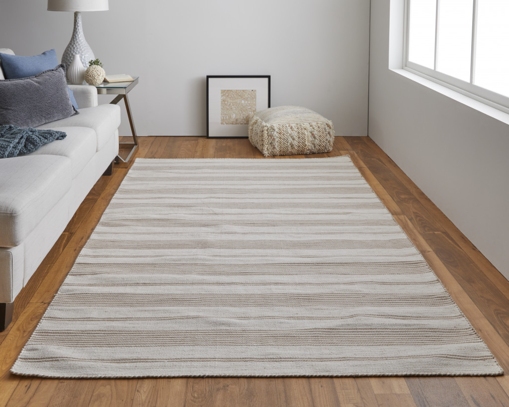 2" X 3" Ivory And Taupe Striped Dhurrie Hand Woven Stain Resistant Area Rug