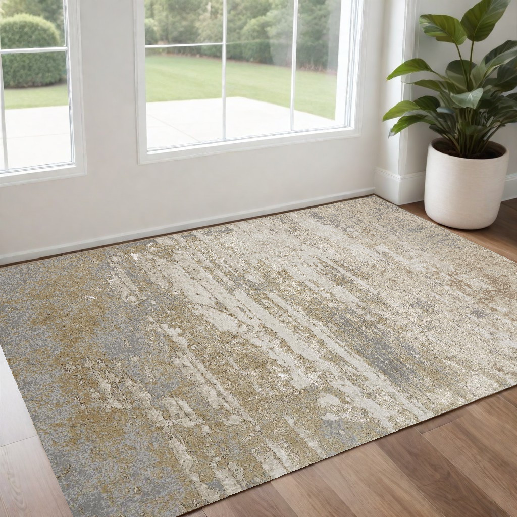 2" X 3" Ivory Gold And Gray Abstract Stain Resistant Area Rug