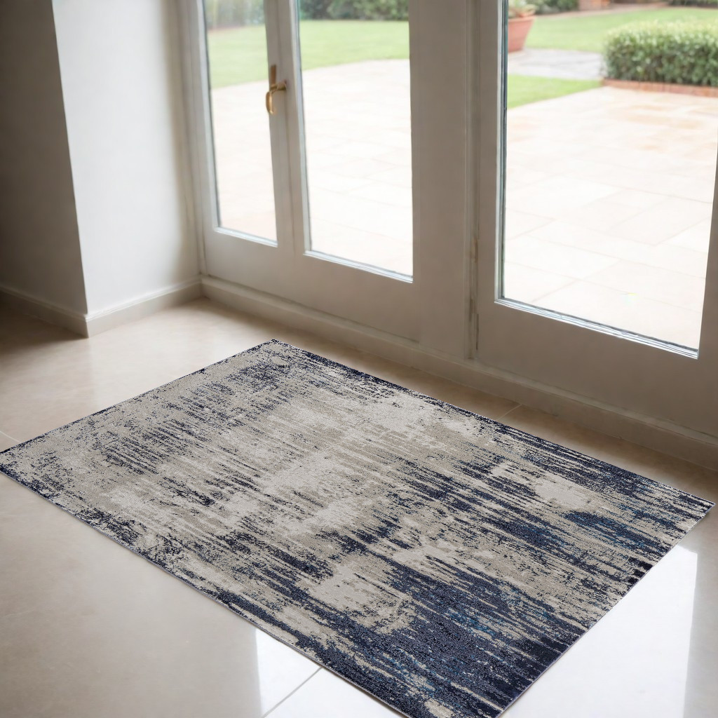 2" X 3" Blue and Ivory Abstract Power Loom Distressed Area Rug