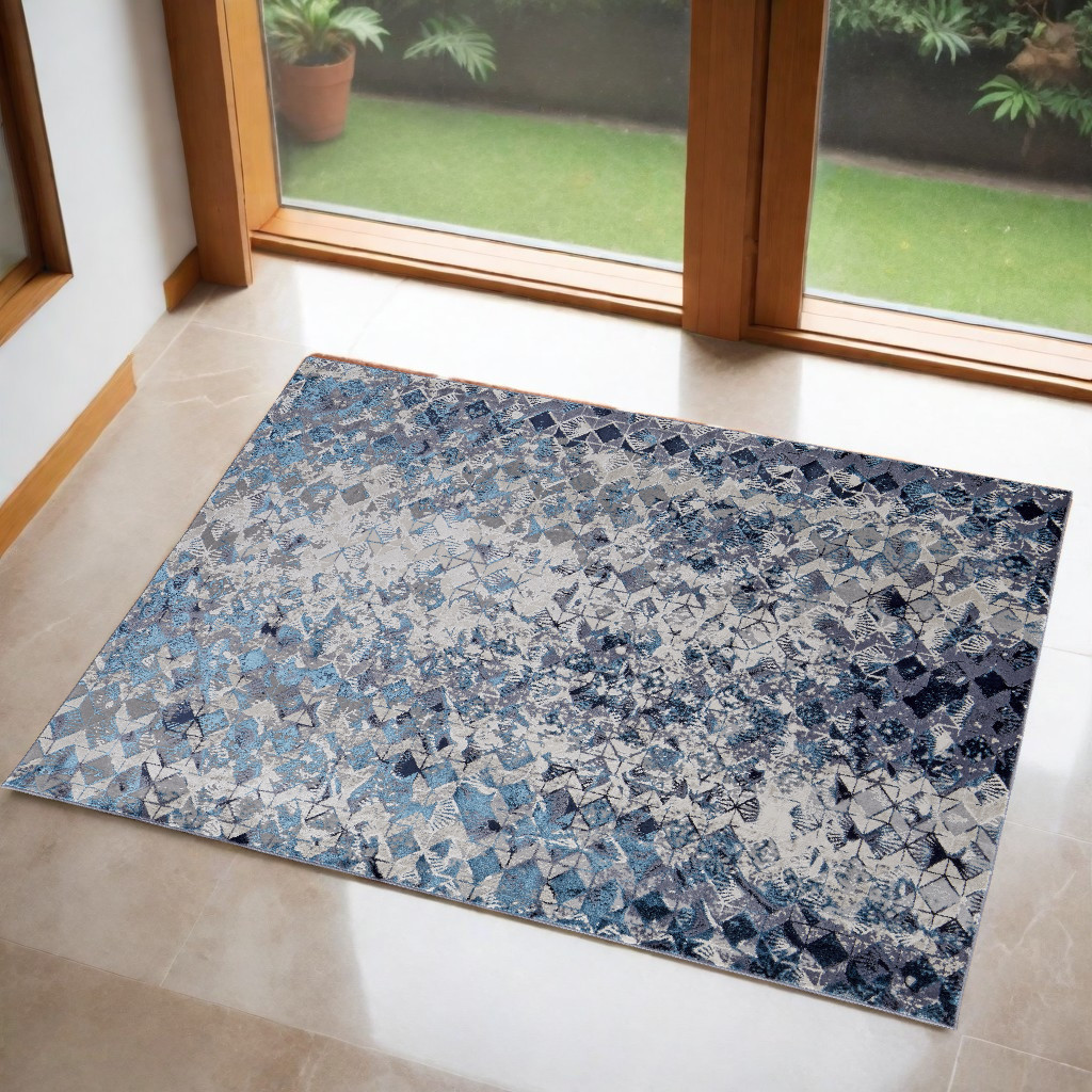 2" X 3" Blue and Ivory Abstract Power Loom Distressed Area Rug