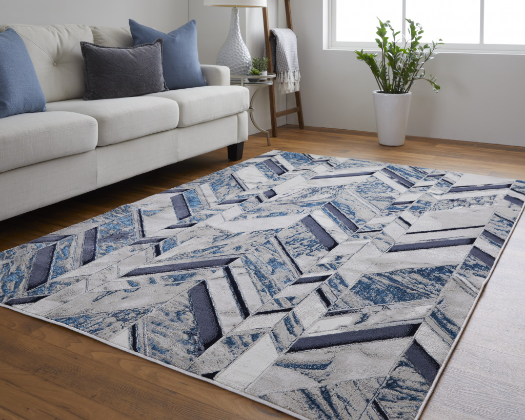 2" X 3" Ivory Blue And Gray Chevron Power Loom Distressed Area Rug
