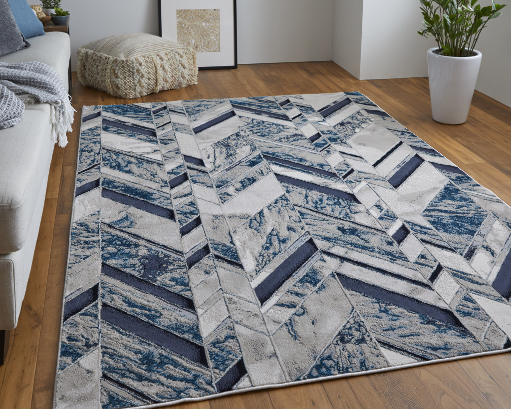 2" X 3" Ivory Blue And Gray Chevron Power Loom Distressed Area Rug