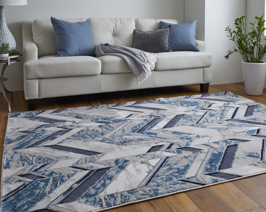 2" X 3" Ivory Blue And Gray Chevron Power Loom Distressed Area Rug