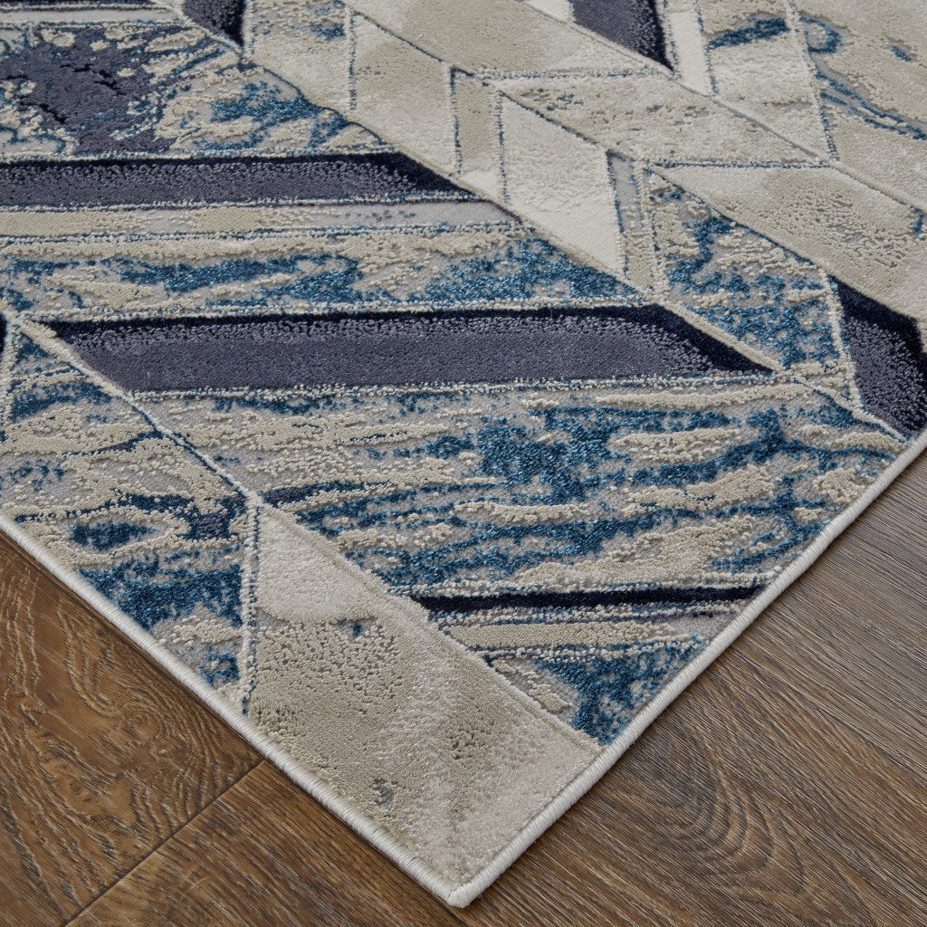 2" X 3" Ivory Blue And Gray Chevron Power Loom Distressed Area Rug