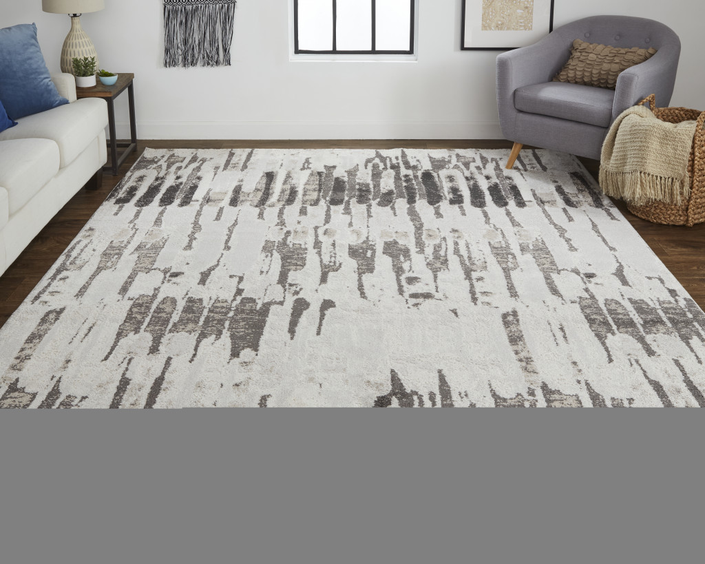 2" X 3" Gray and Ivory Abstract Power Loom Area Rug