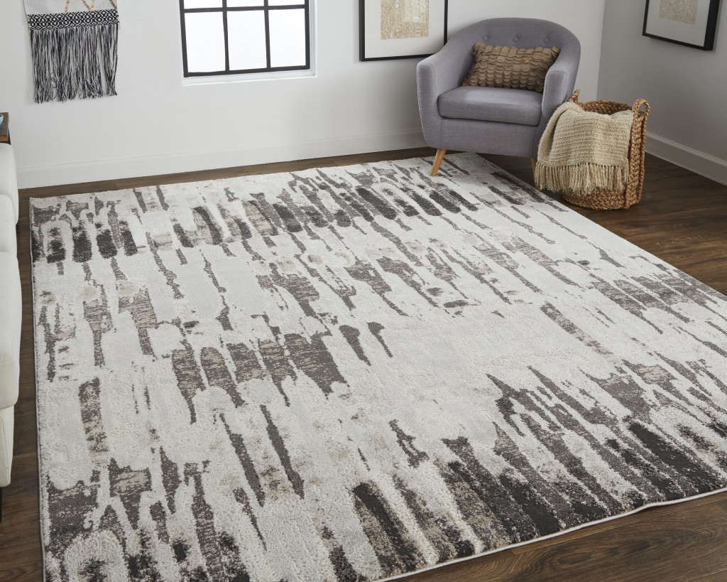 2" X 3" Gray and Ivory Abstract Power Loom Area Rug