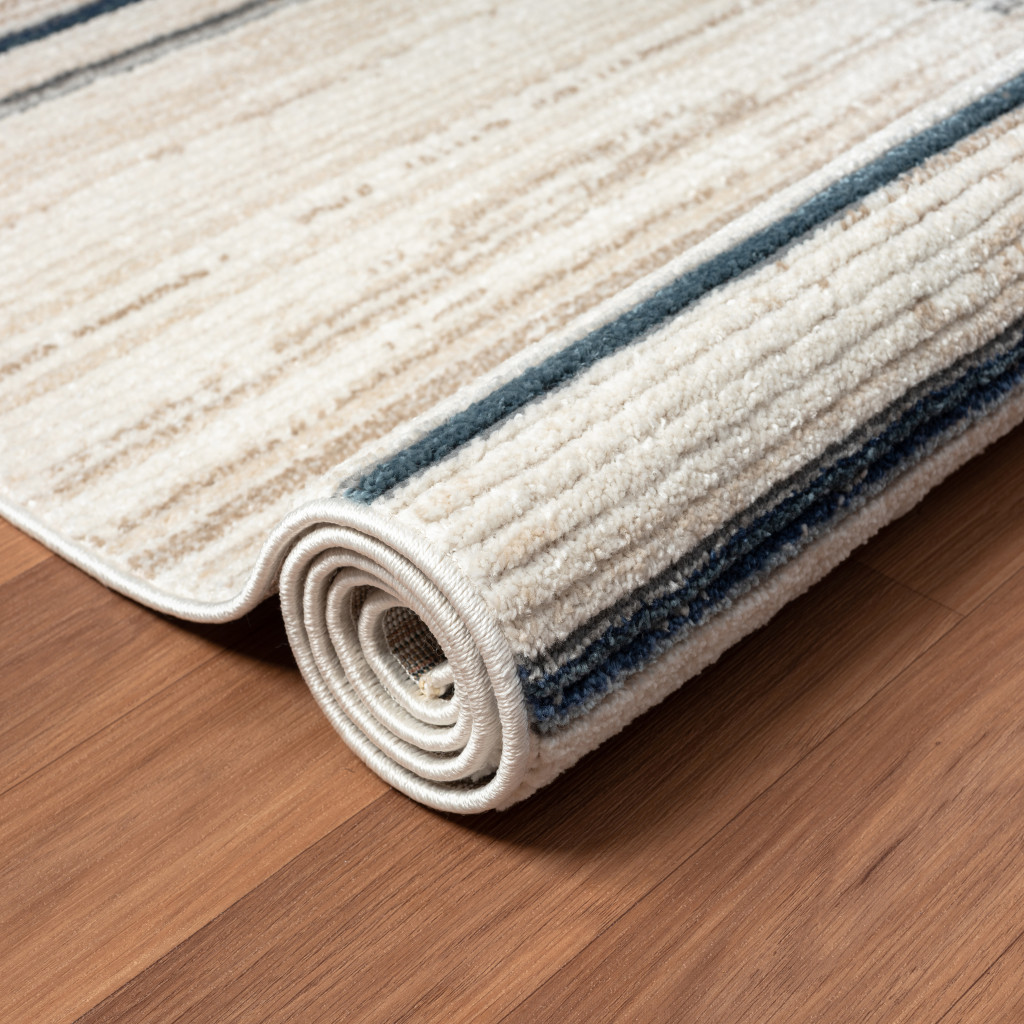5" X 7" Ivory Blue and Gray Geometric Area Rug