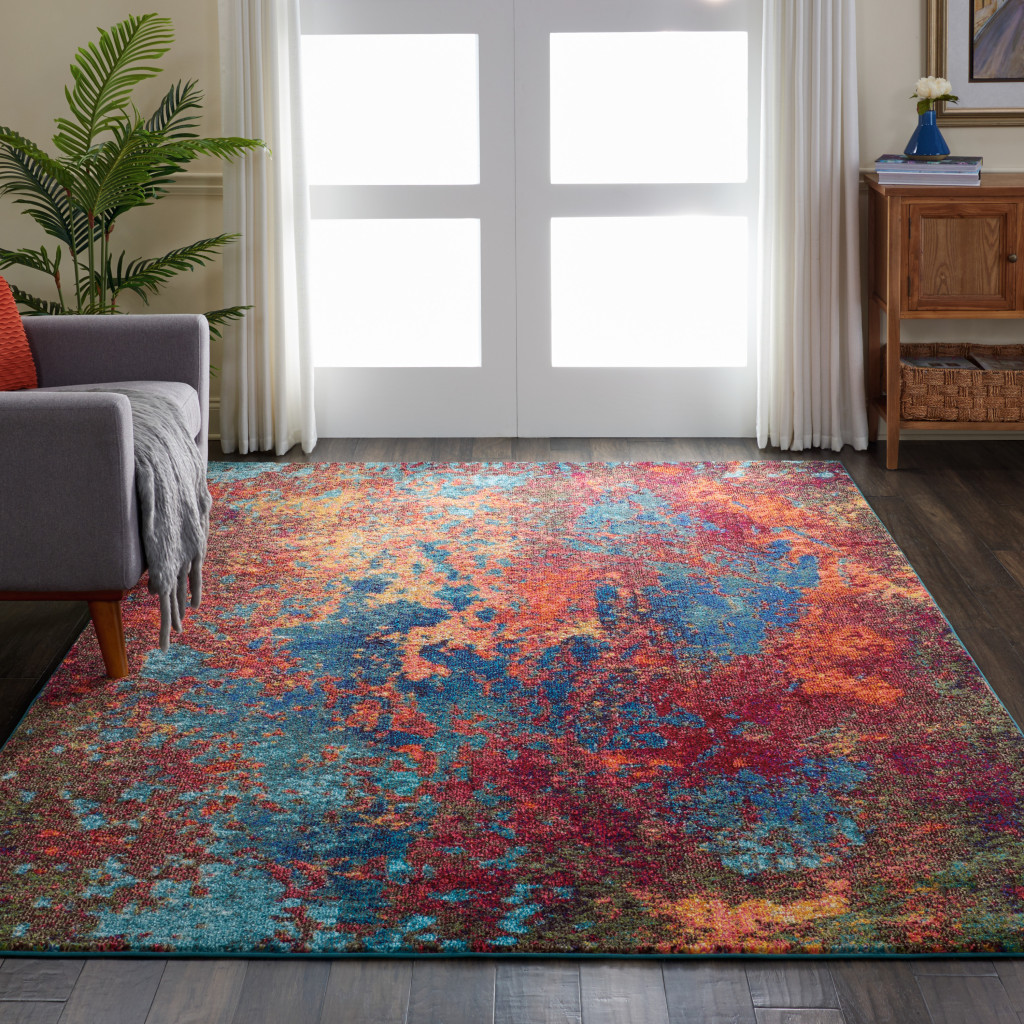 7" X 10" Blue and Orange Abstract Power Loom Area Rug