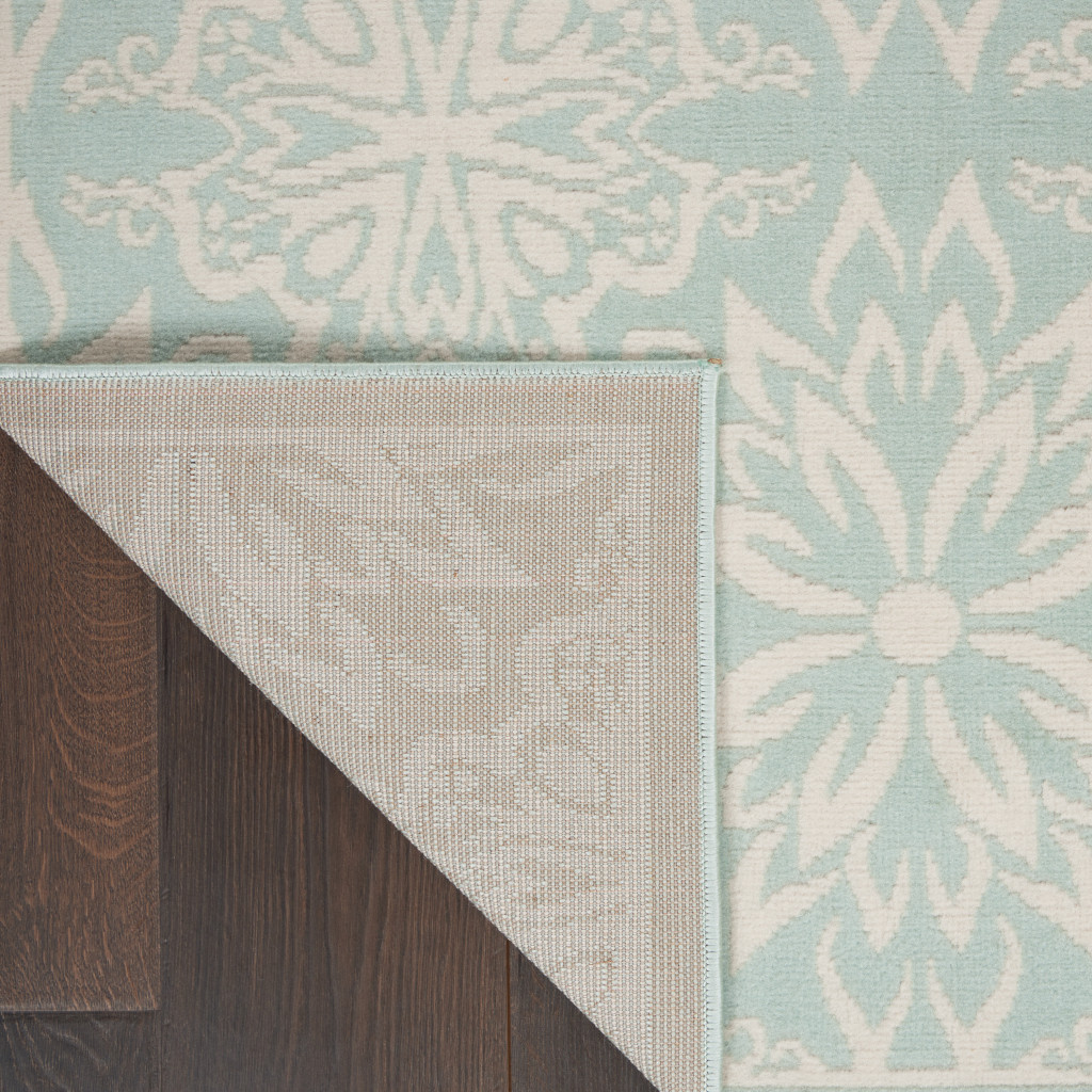 5" X 7" Blue and Ivory Floral Medallion Power Loom Area Rug