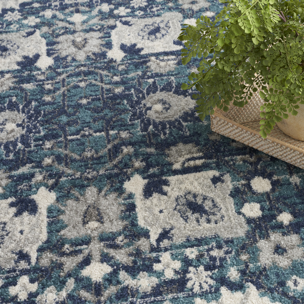 5" X 7" Navy Blue Floral Power Loom Distressed Area Rug