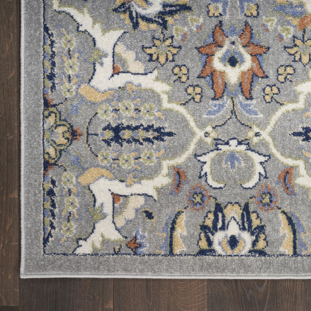5" X 7" Green and Ivory Floral Power Loom Area Rug