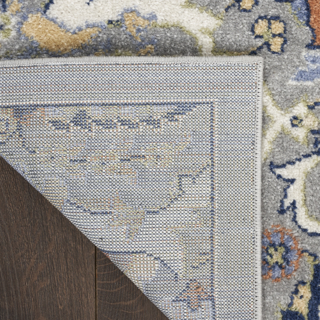 5" X 7" Green and Ivory Floral Power Loom Area Rug