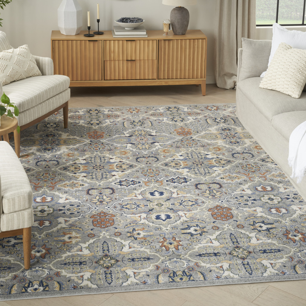 5" X 7" Green and Ivory Floral Power Loom Area Rug