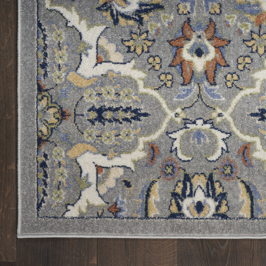 6 x 9 green and Ivory Floral Power Loom Area Rug