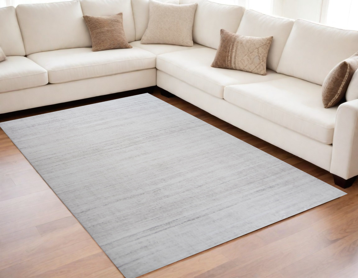 5" X 8" Beige Abstract Area Rug