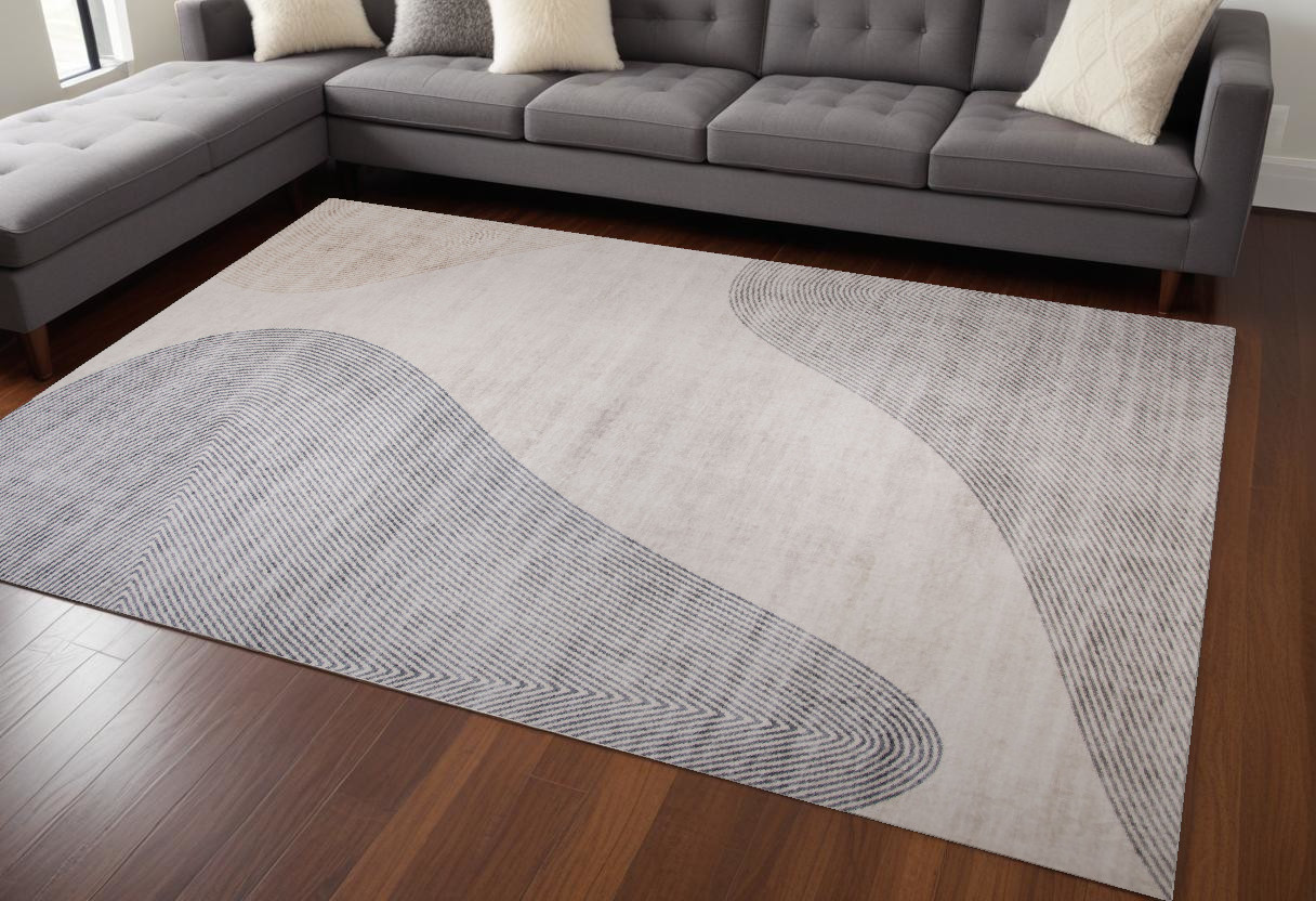 8" X 11" Beige and Brown Abstract Distressed Area Rug