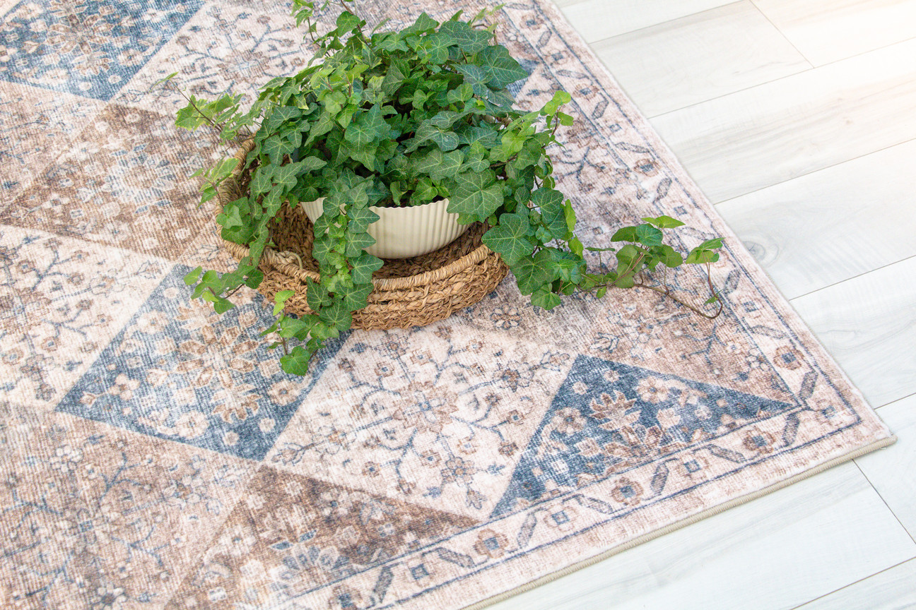 5" X 8" Brown and Blue Floral Distressed Area Rug