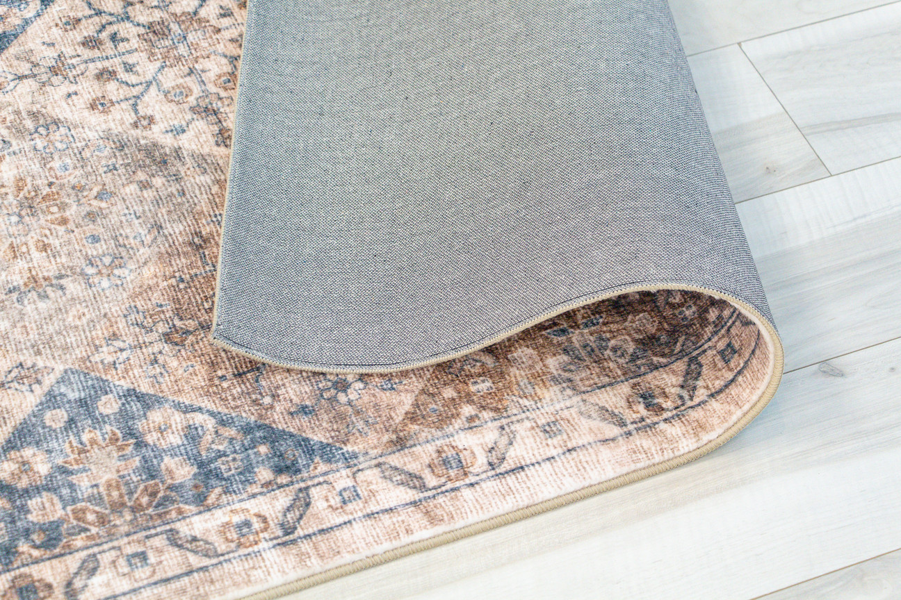 5" X 8" Brown and Blue Floral Distressed Area Rug