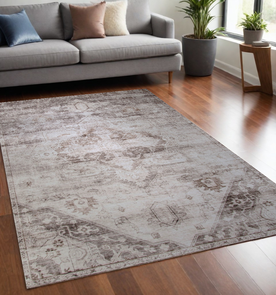 5" X 8" Brown and Ivory Oriental Area Rug