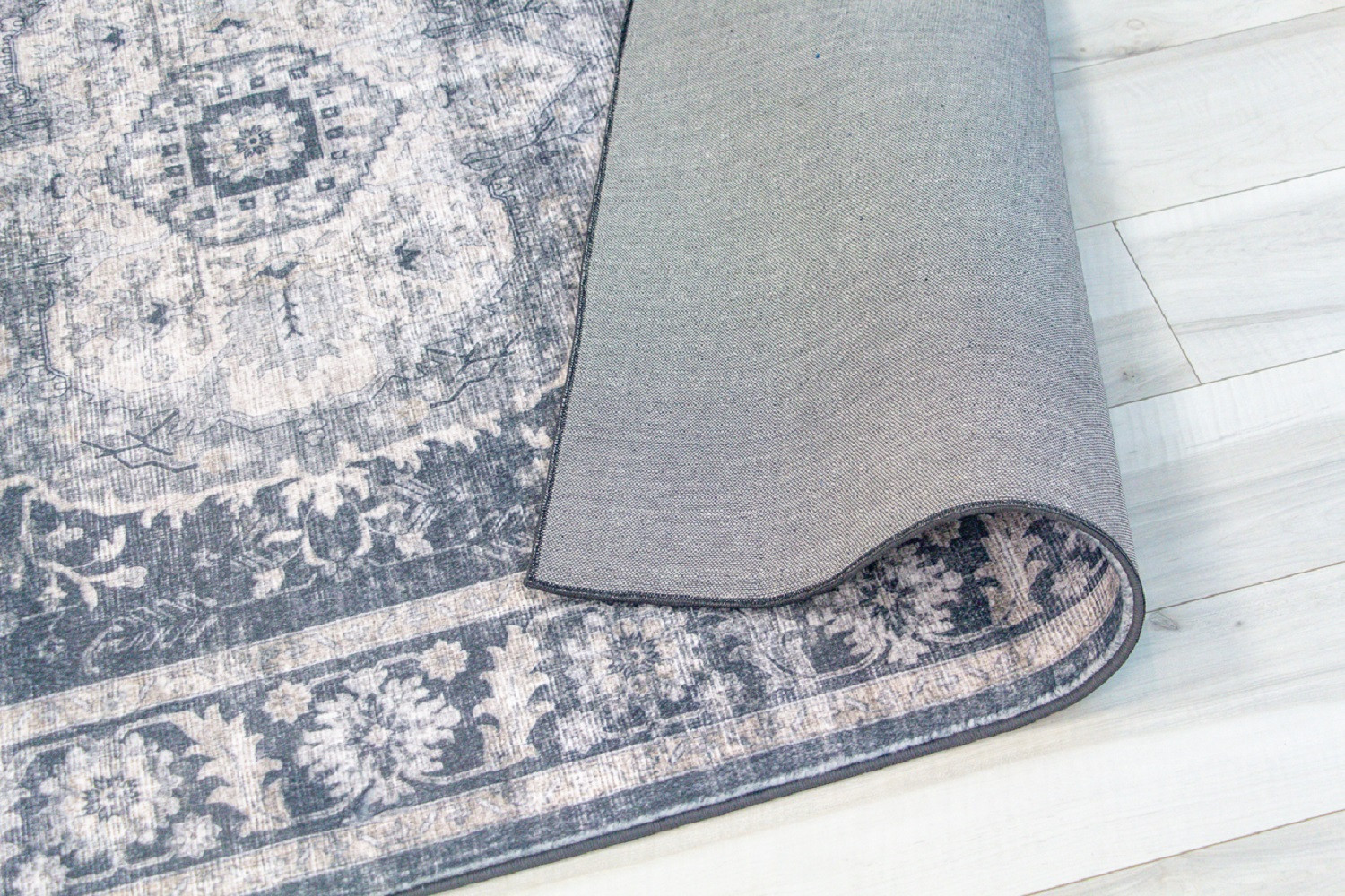 5" X 8" Black and Gray Oriental Area Rug