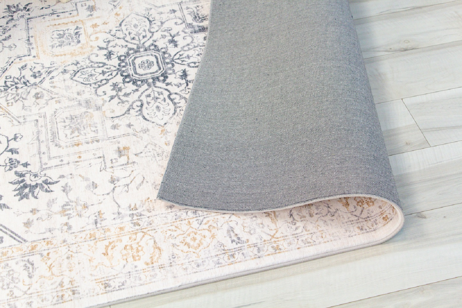 5" X 8" Gray and Gold Oriental Area Rug