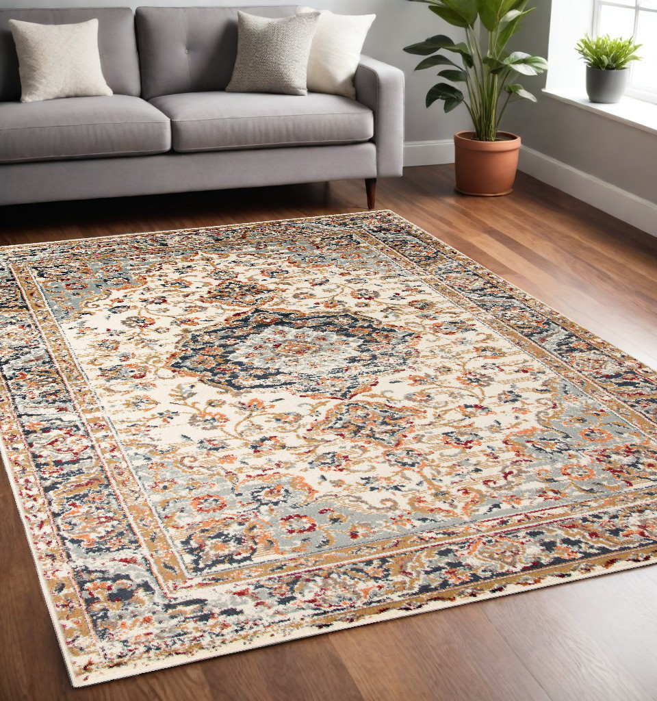 5" X 8" Ivory Navy and Orange Medallion Power Loom Area Rug