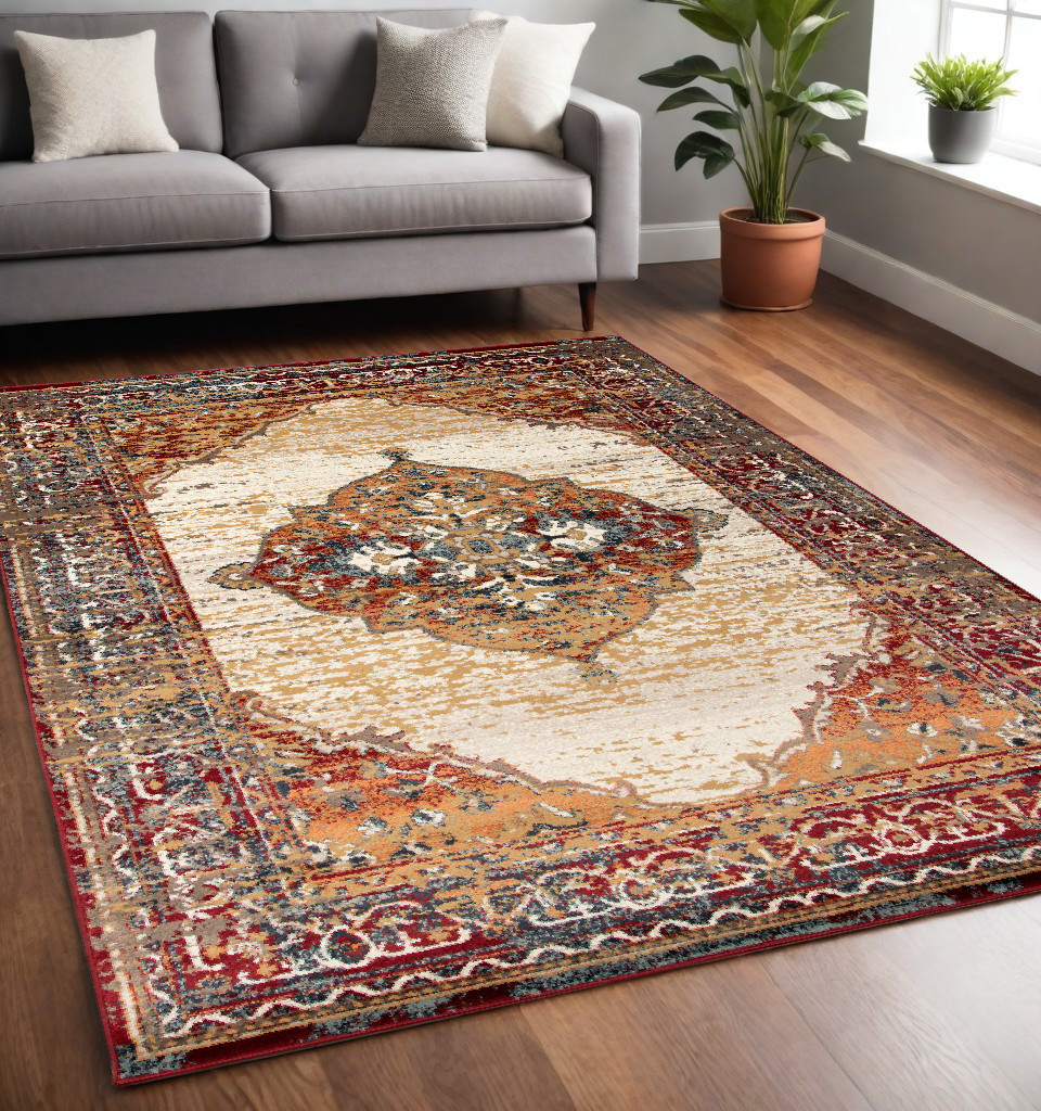 5" X 8" Ivory Red and Orange Medallion Power Loom Area Rug