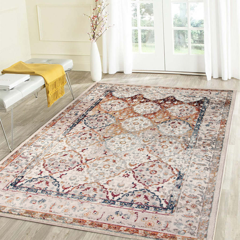 5" X 8" Beige Rust and Navy Floral Medallion Power Loom Area Rug