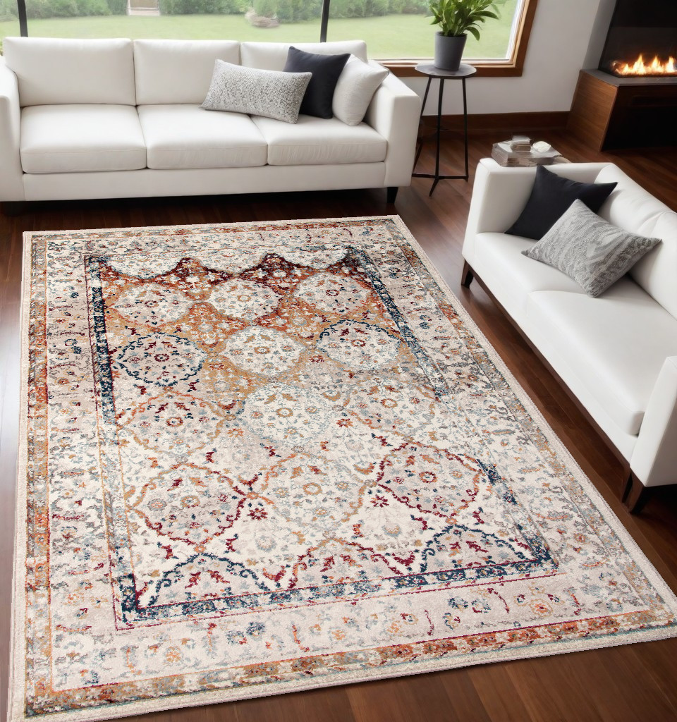 5" X 8" Beige Rust and Navy Floral Medallion Power Loom Area Rug