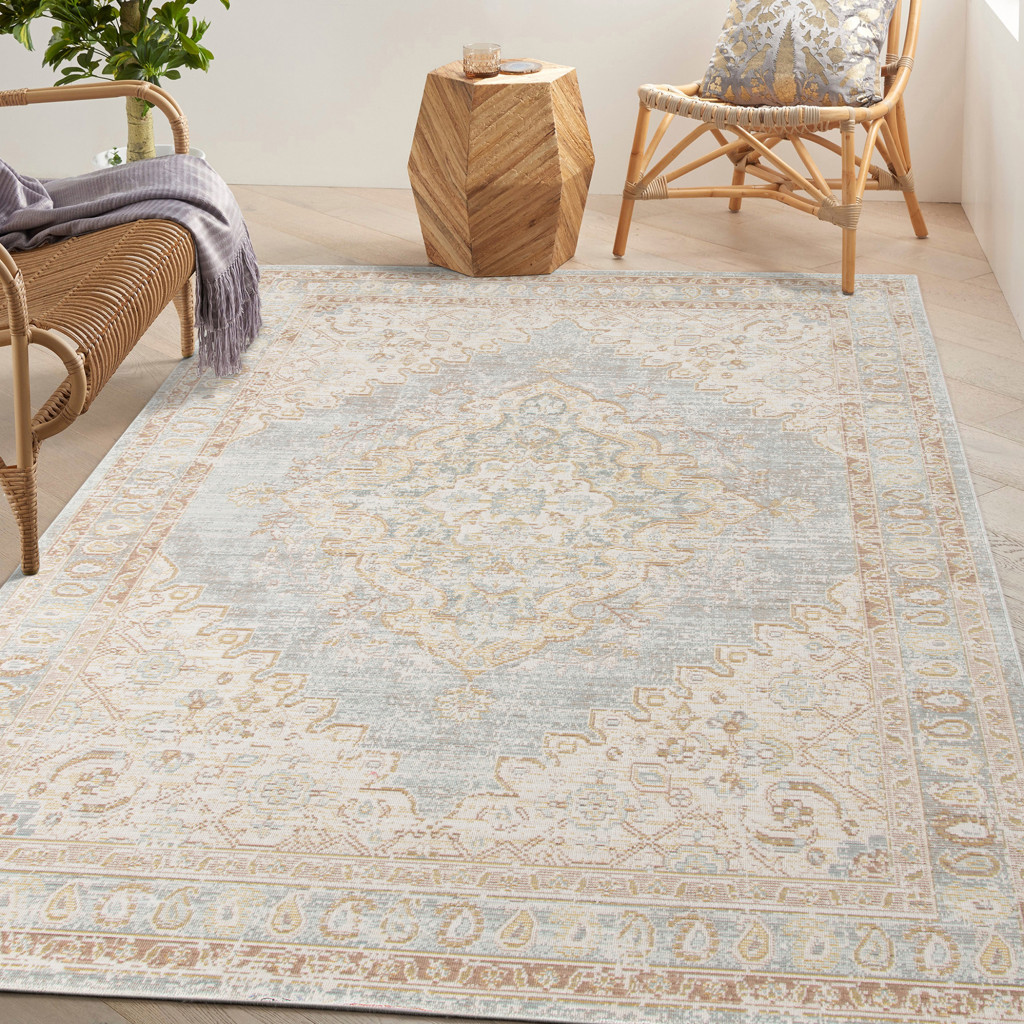 5" X 7" Beige and Gray Medallion Power Loom Area Rug