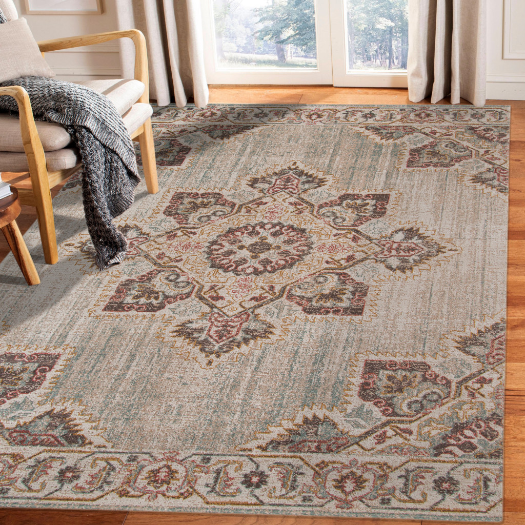 6" X 8" Beige and Rust Medallion Power Loom Area Rug