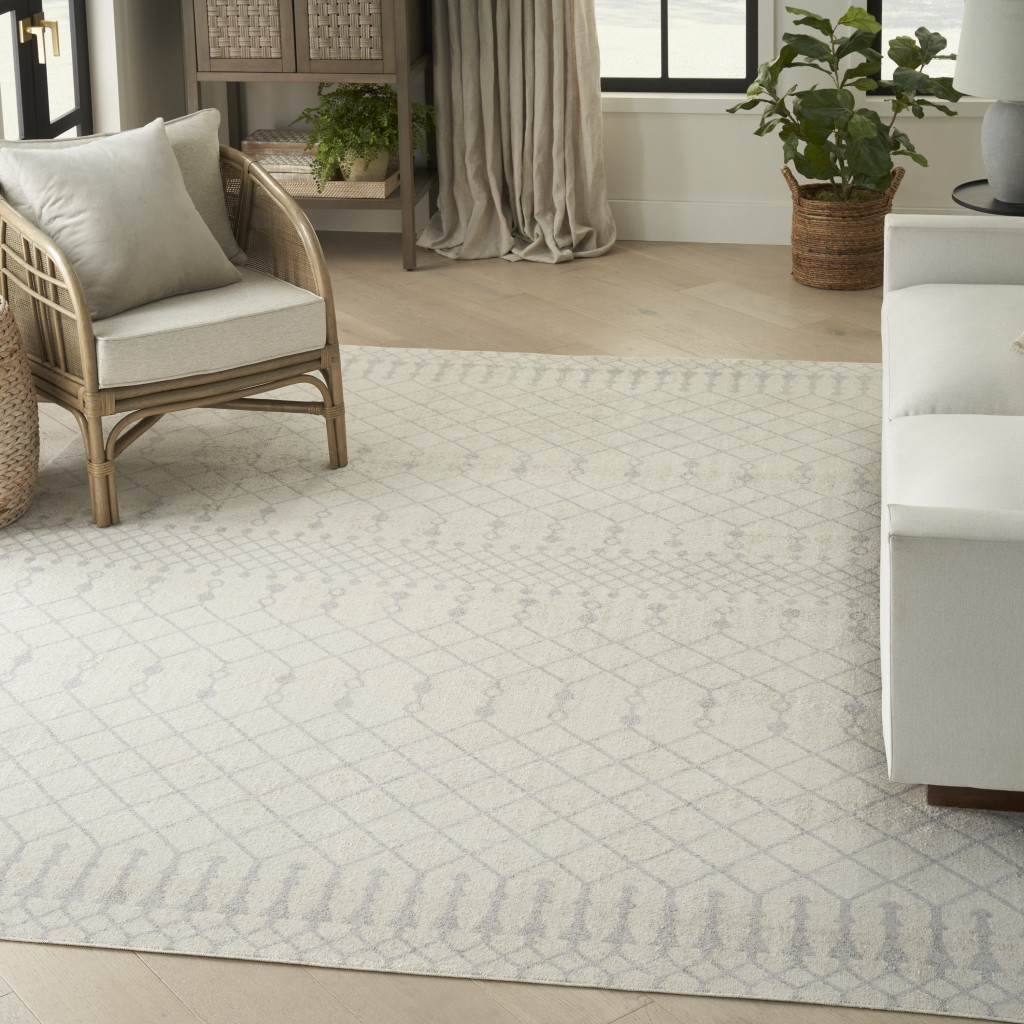 4" X 6" Blue and Ivory Abstract Power Loom Washable Area Rug
