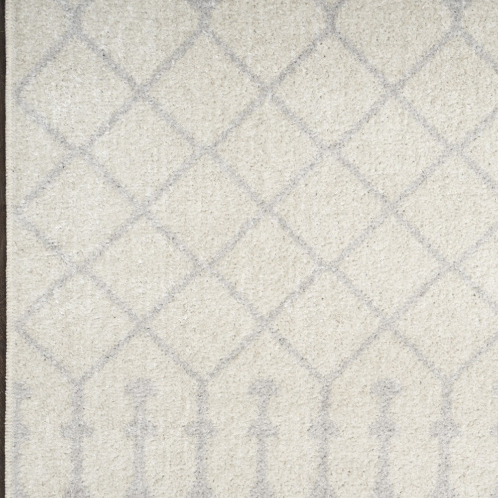 4" X 6" Blue and Ivory Abstract Power Loom Washable Area Rug