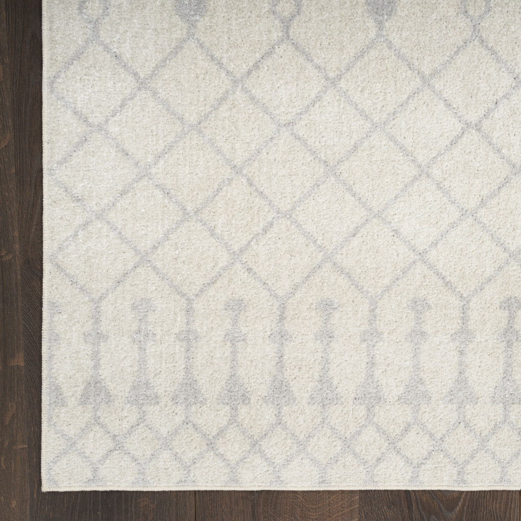 4" X 6" Blue and Ivory Abstract Power Loom Washable Area Rug