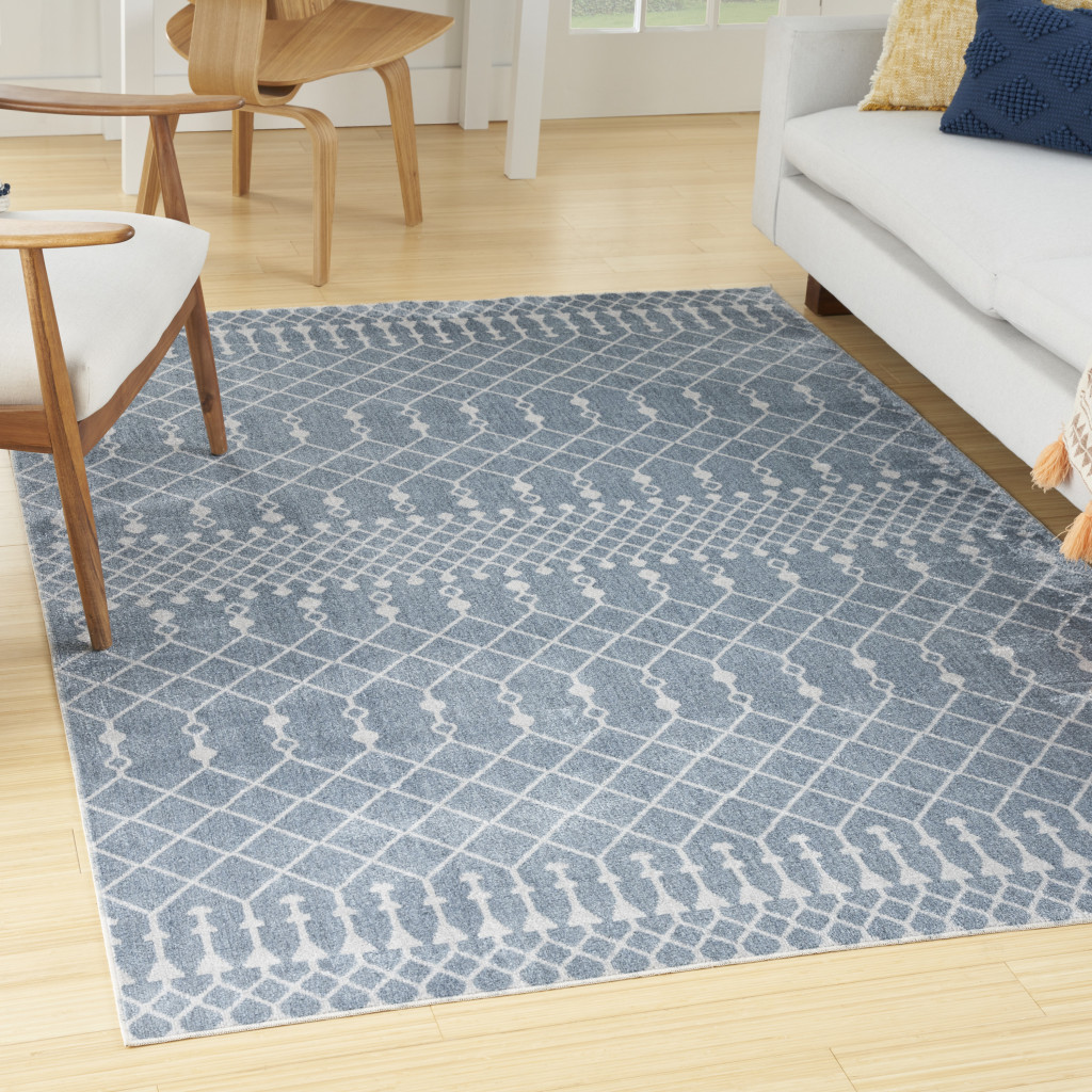 5" X 7" Blue and Ivory Abstract Power Loom Washable Area Rug