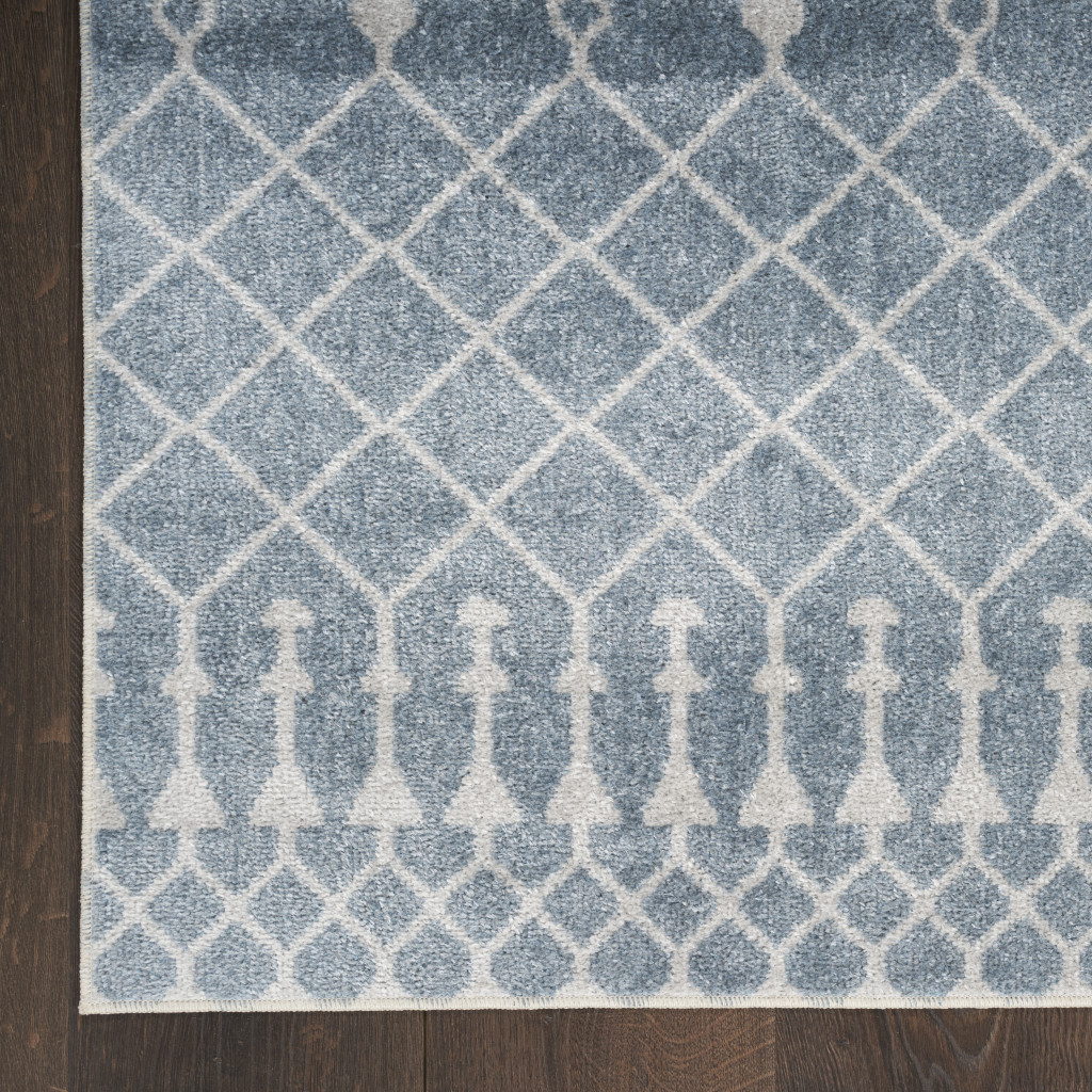 5" X 7" Blue and Ivory Abstract Power Loom Washable Area Rug