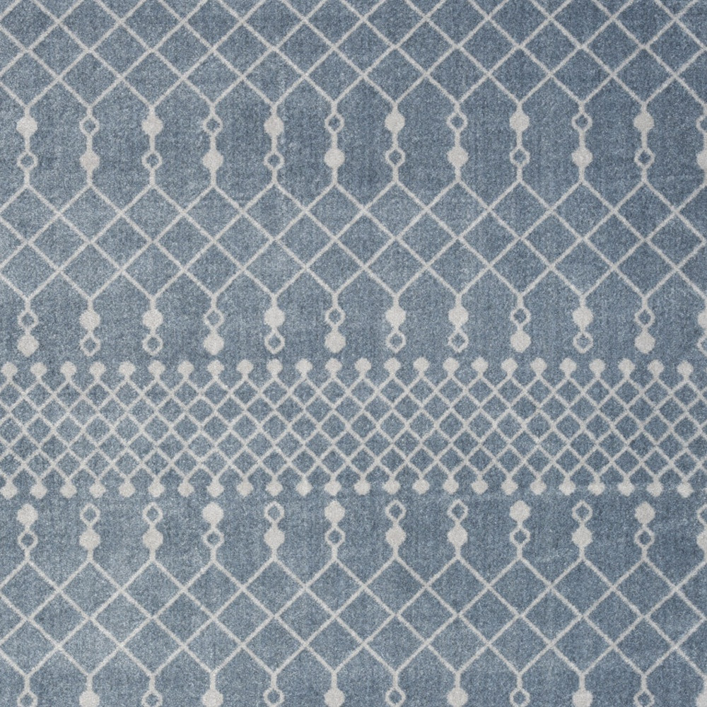5" X 7" Blue and Ivory Abstract Power Loom Washable Area Rug