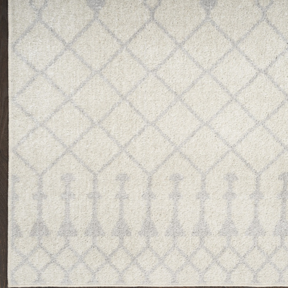 8" X 10" Blue and Ivory Abstract Power Loom Washable Area Rug