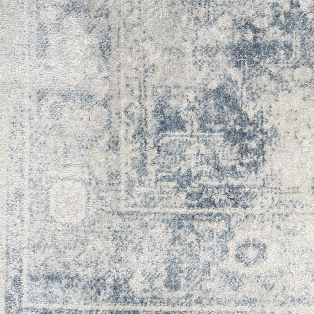 8" X 10" Blue and Ivory Abstract Power Loom Washable Area Rug