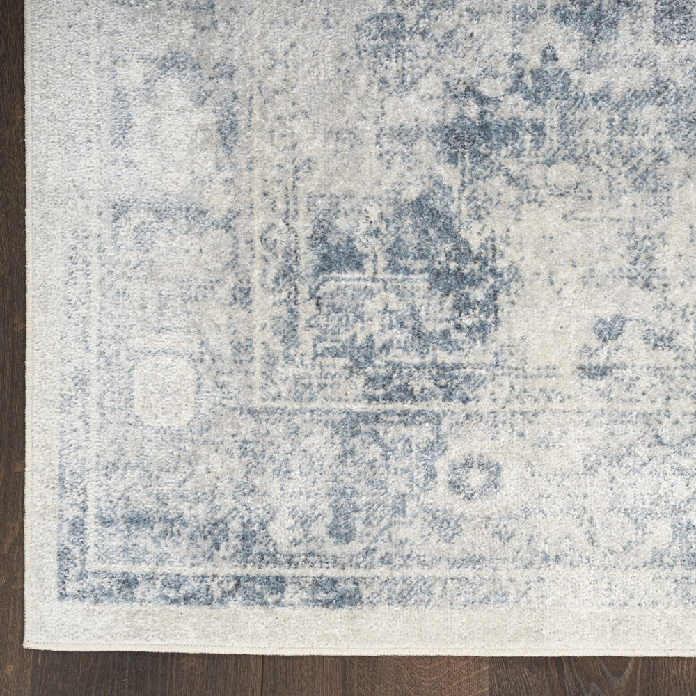 8" X 10" Blue and Ivory Abstract Power Loom Washable Area Rug