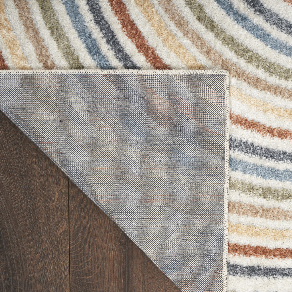 5" X 7" Blue and Ivory Geometric Power Loom Washable Area Rug