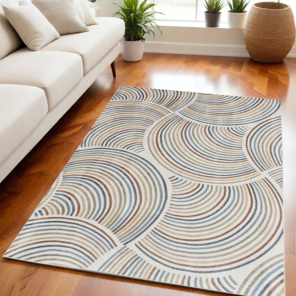 5" X 7" Blue and Ivory Geometric Power Loom Washable Area Rug