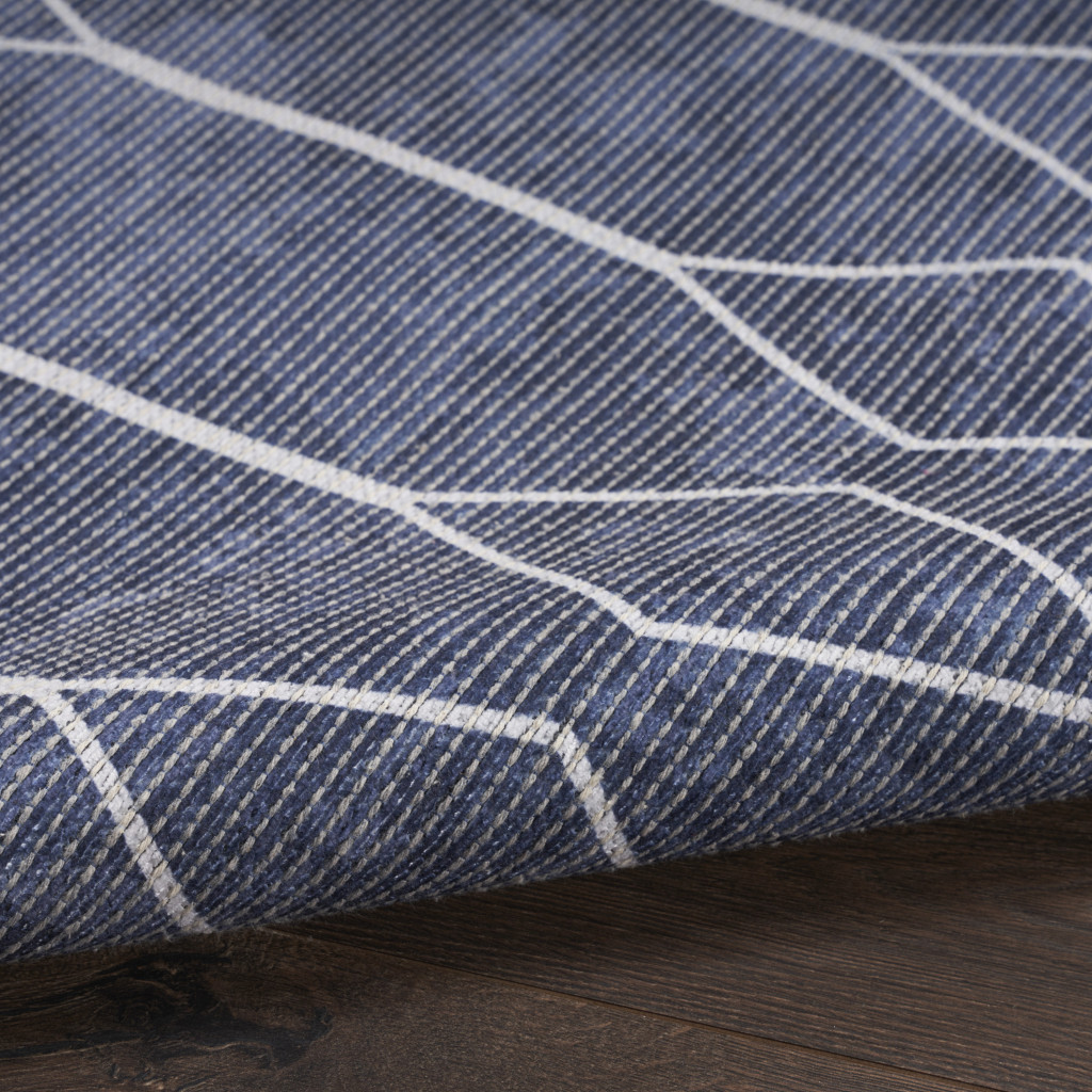 5" X 7" Blue and Ivory Geometric Power Loom Washable Area Rug