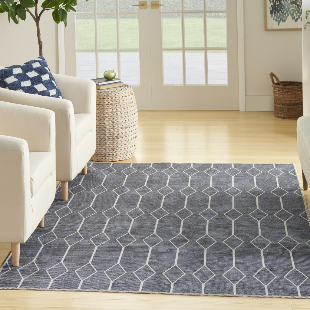 5" X 7" Blue and Ivory Geometric Power Loom Washable Area Rug