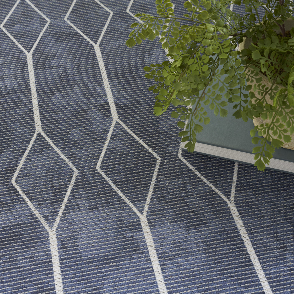 5" X 7" Blue and Ivory Geometric Power Loom Washable Area Rug