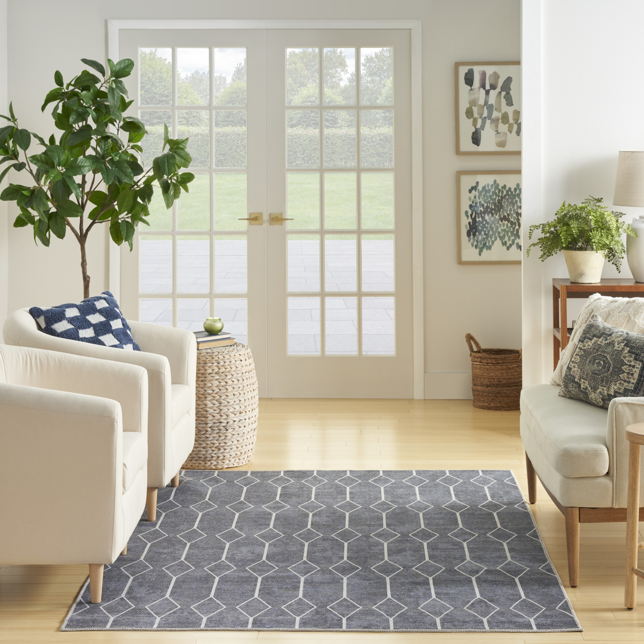 5" X 7" Blue and Ivory Geometric Power Loom Washable Area Rug