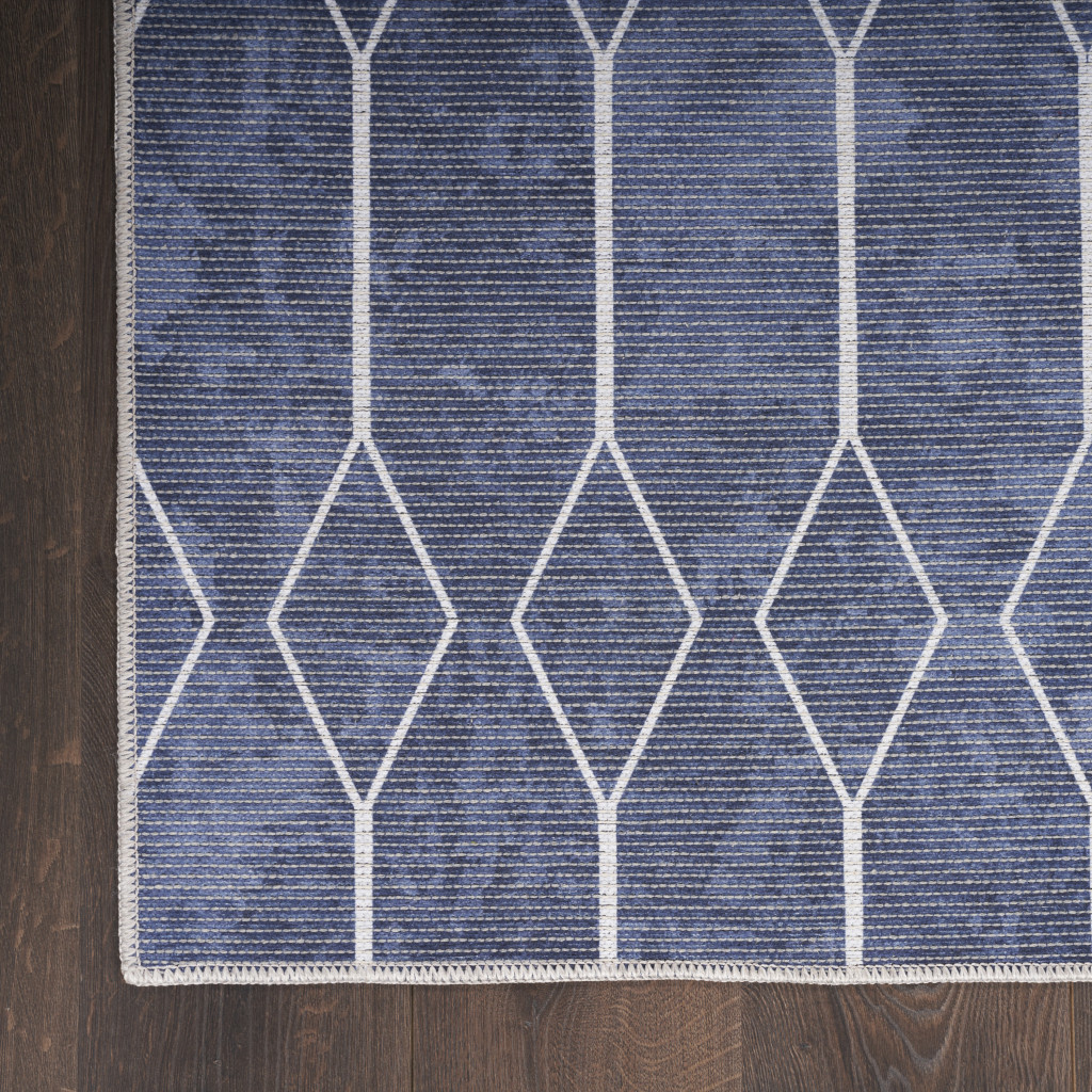 6 x 9 Blue and Ivory geometric Power Loom Washable Area Rug