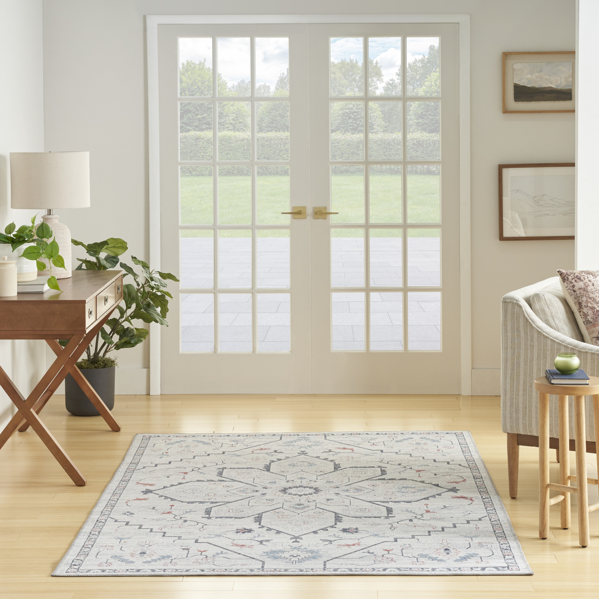 6" X 9" Ivory and Blue Oriental Power Loom Washable Area Rug