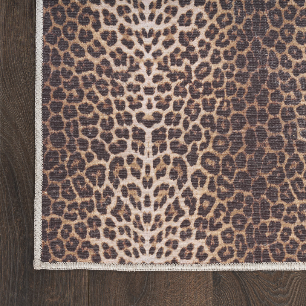 5" X 7" Brown and Ivory Leopard Print Power Loom Washable Non Skid Area Rug