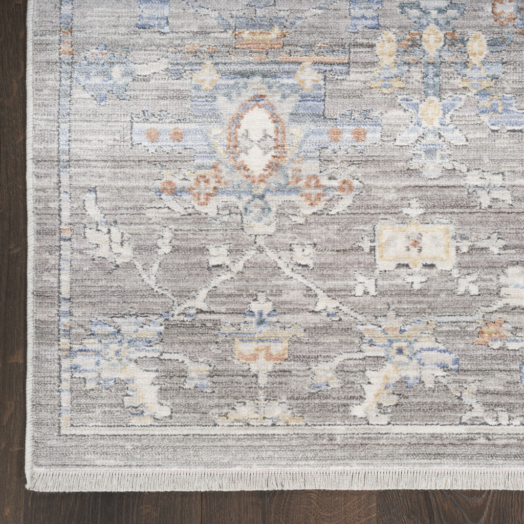 8" X 10" Ivory Blue and Gray Oriental Power Loom Distressed Area Rug With Fringe